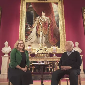 Andrew Davies and Kathryn Jones in conversation in front of portrait of George IV